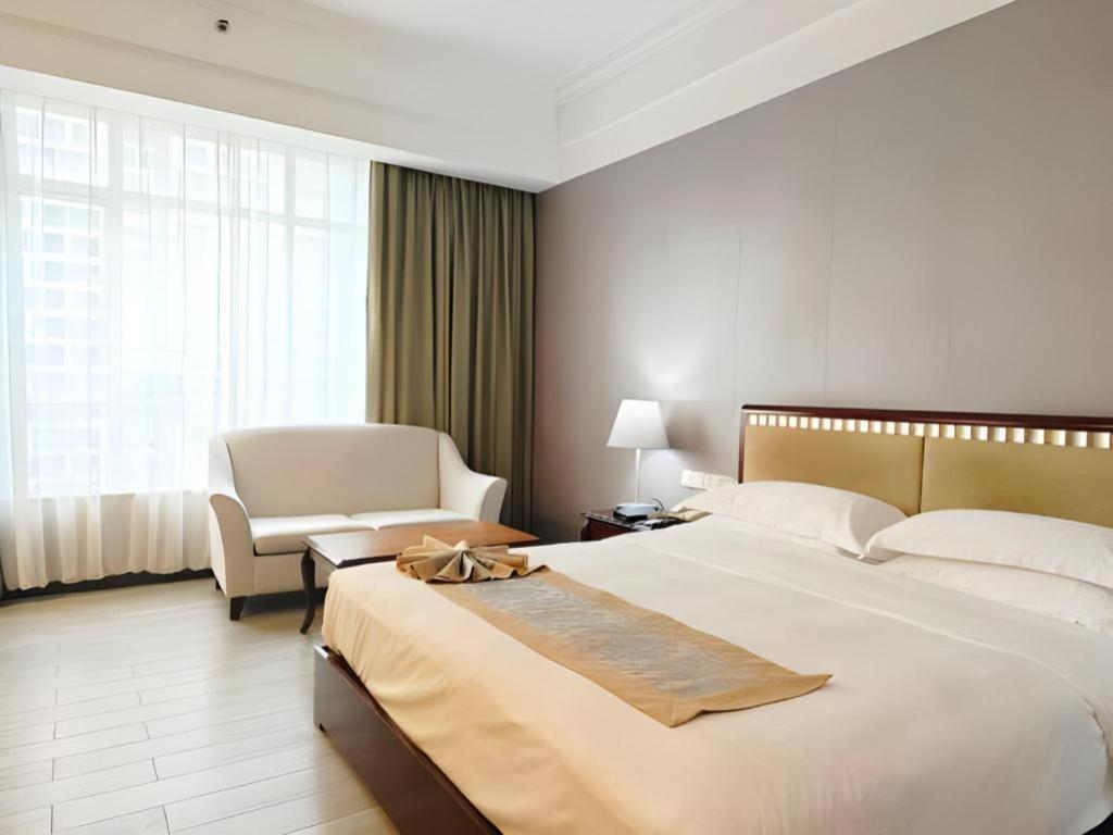 פושאן Hua Xia Pearl Hotel מראה חיצוני תמונה