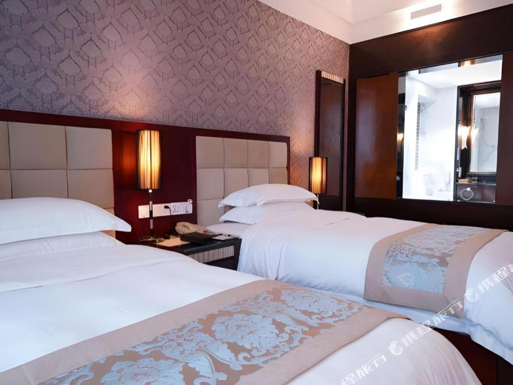 פושאן Hua Xia Pearl Hotel מראה חיצוני תמונה