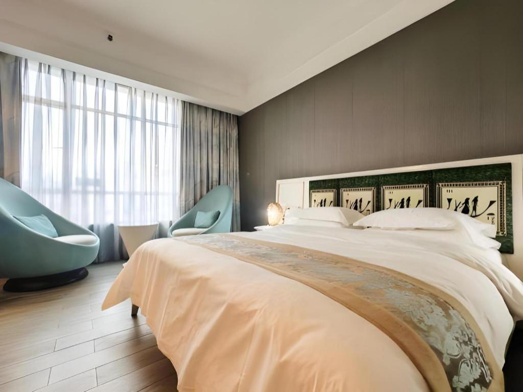 פושאן Hua Xia Pearl Hotel מראה חיצוני תמונה