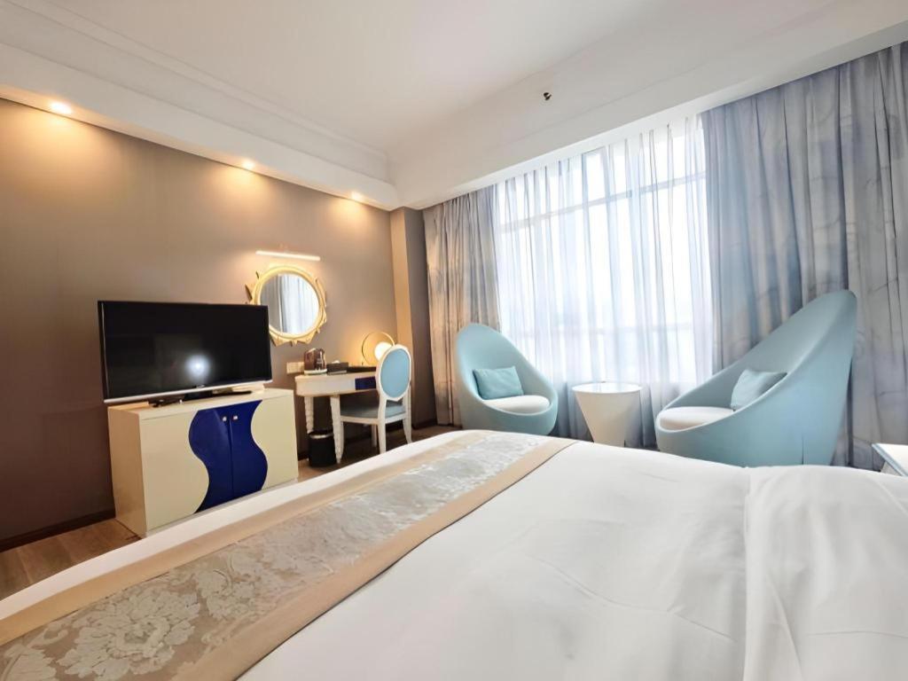 פושאן Hua Xia Pearl Hotel מראה חיצוני תמונה