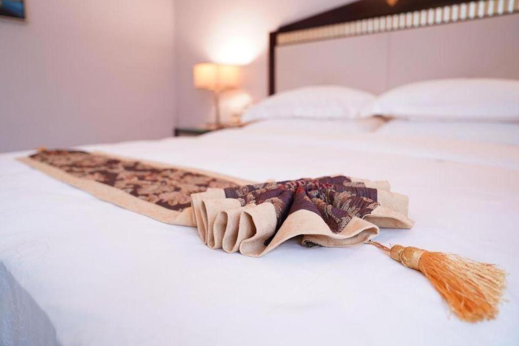 פושאן Hua Xia Pearl Hotel מראה חיצוני תמונה