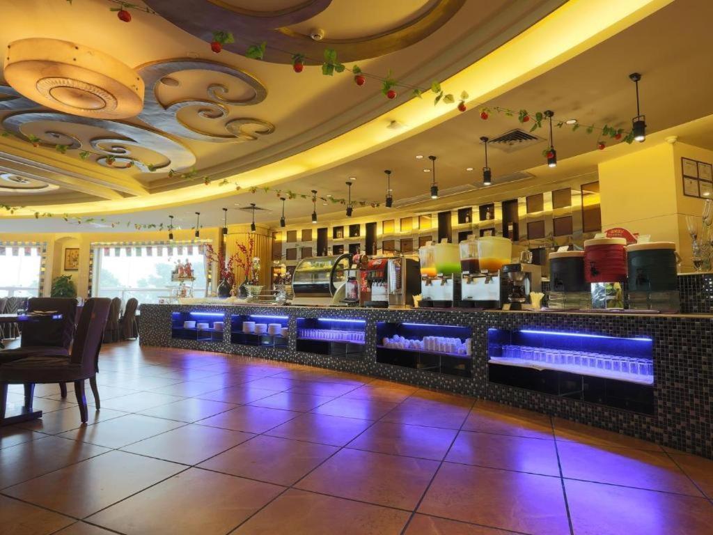 פושאן Hua Xia Pearl Hotel מראה חיצוני תמונה